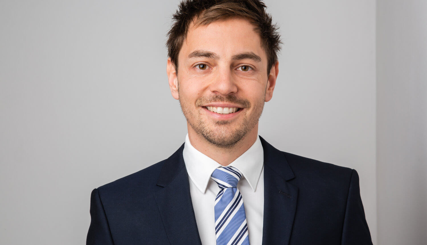 Portraitbild von Prognos-Mitarbeiter Heiko Burret